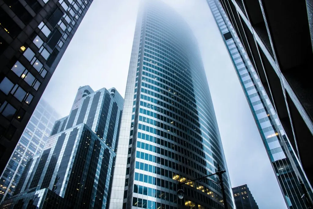 Looking up at modern high-rise office buildings